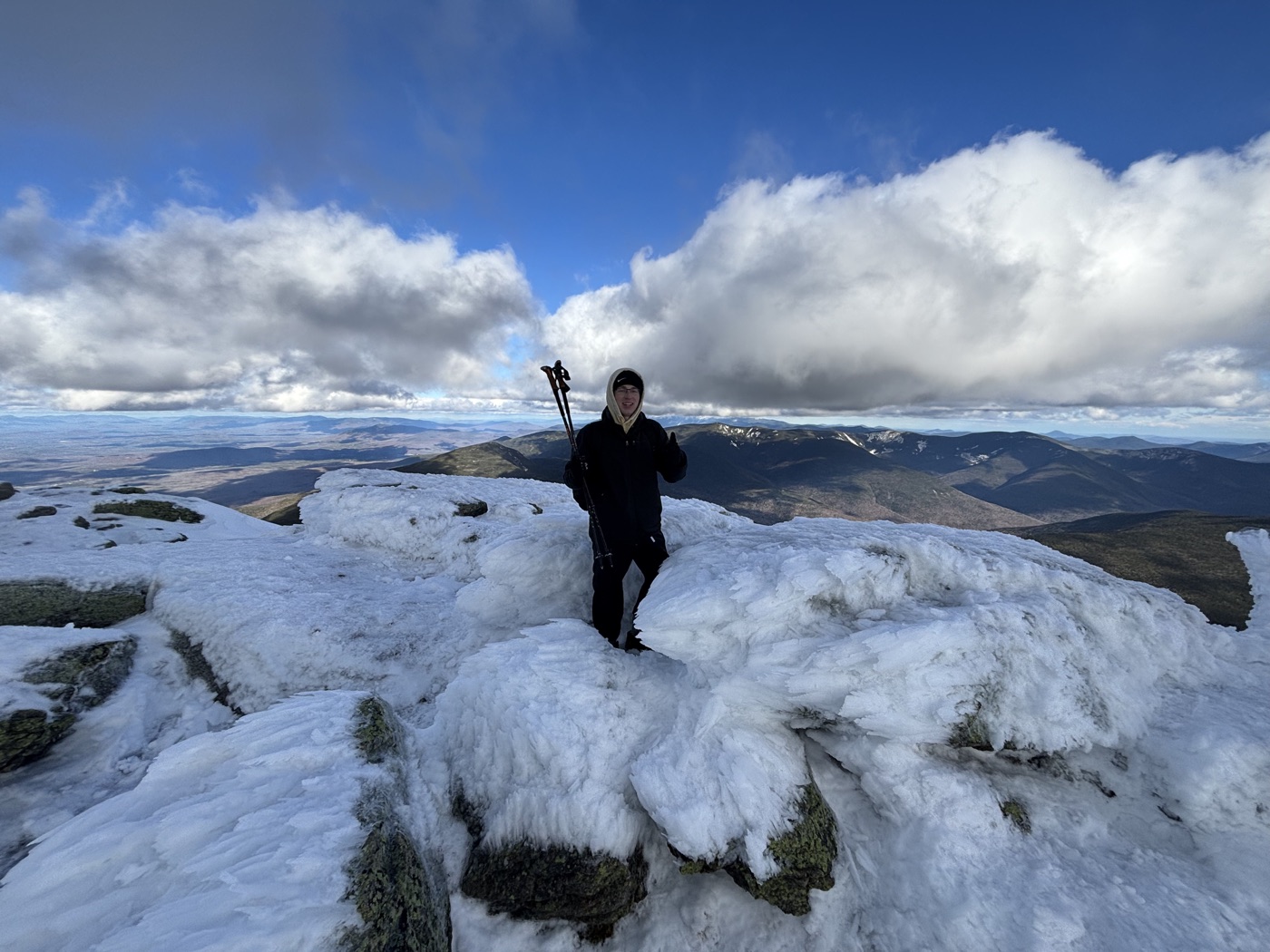 Caleb Summiting a Mountain
